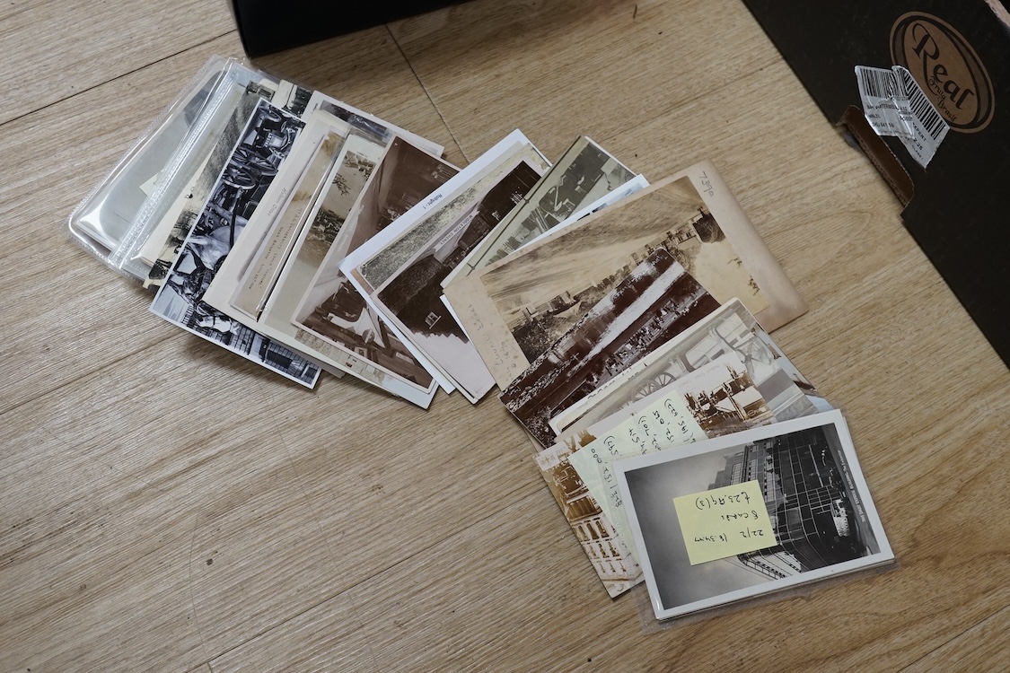A collection of early 20th century postcards, photographs, etc. Including three albums of novelty postcards, scenes of London, etc. First World War postcards, etc. and an Edwardian photograph album, together with four bo